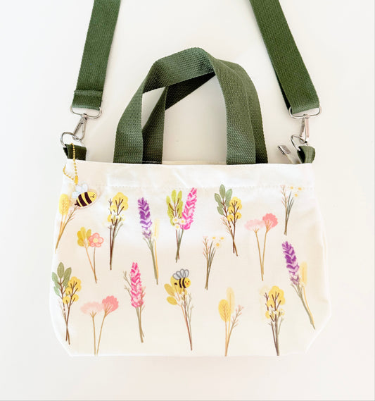 Floral print tote bag with green strap