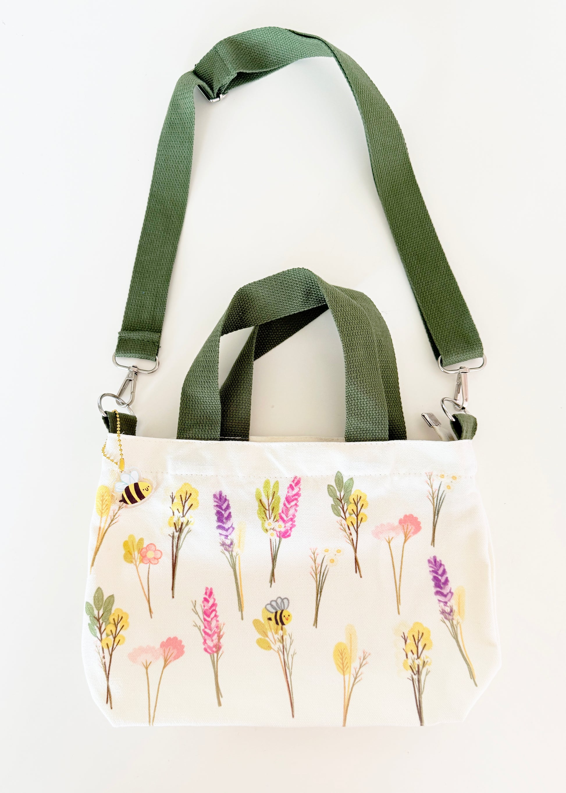 Floral print tote bag with green strap