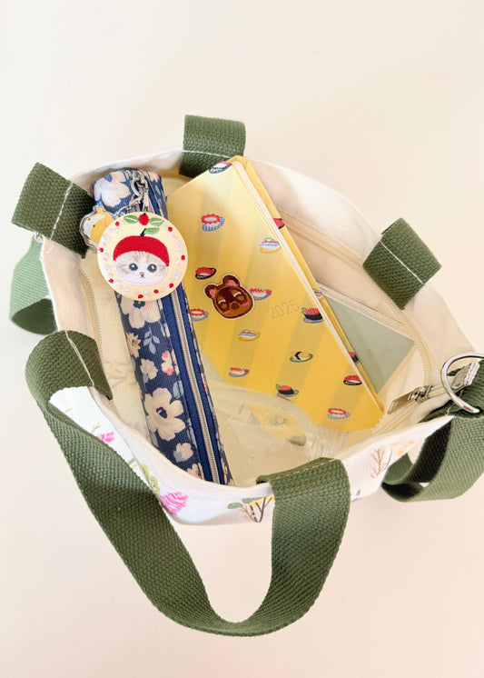 Floral print bag with contents