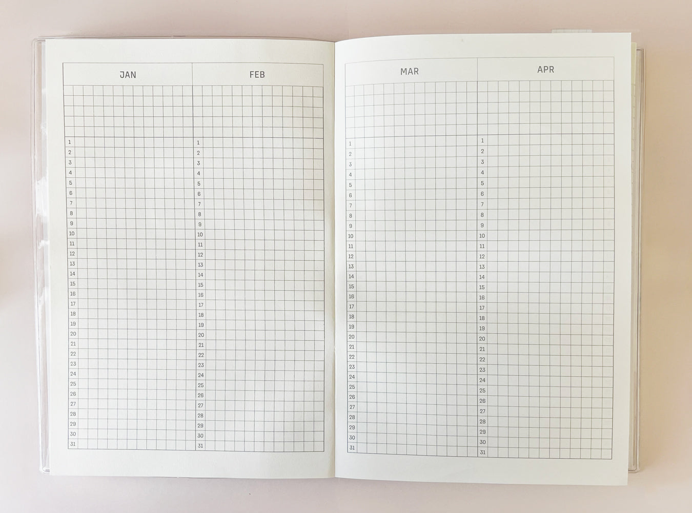 Blank diary spread with monthly grid layout (Jan-Apr)