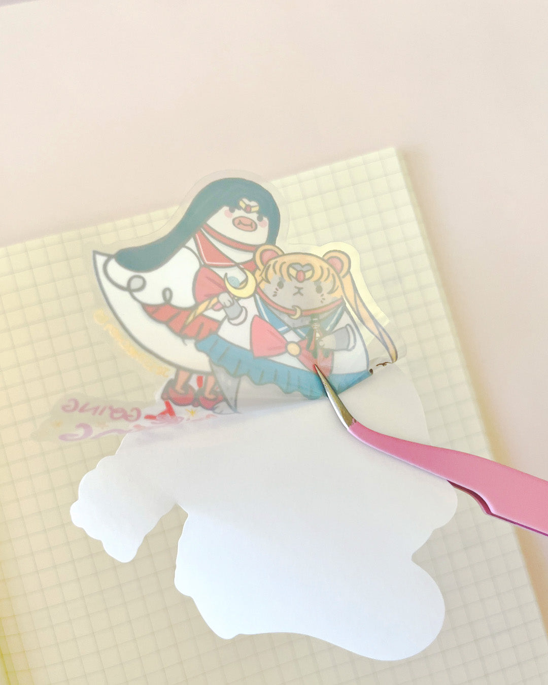 Die-cut Sailor Moon cosplay sticker being applied.