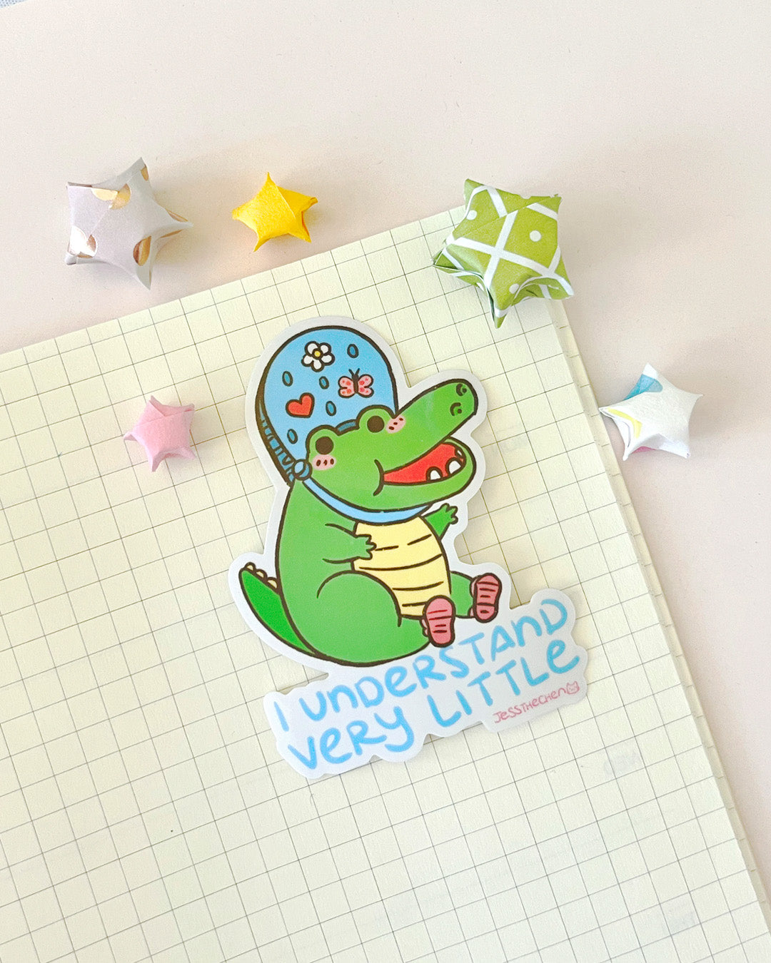 Web Die-Cut Maria sticker of an alligator saying I understand very little
