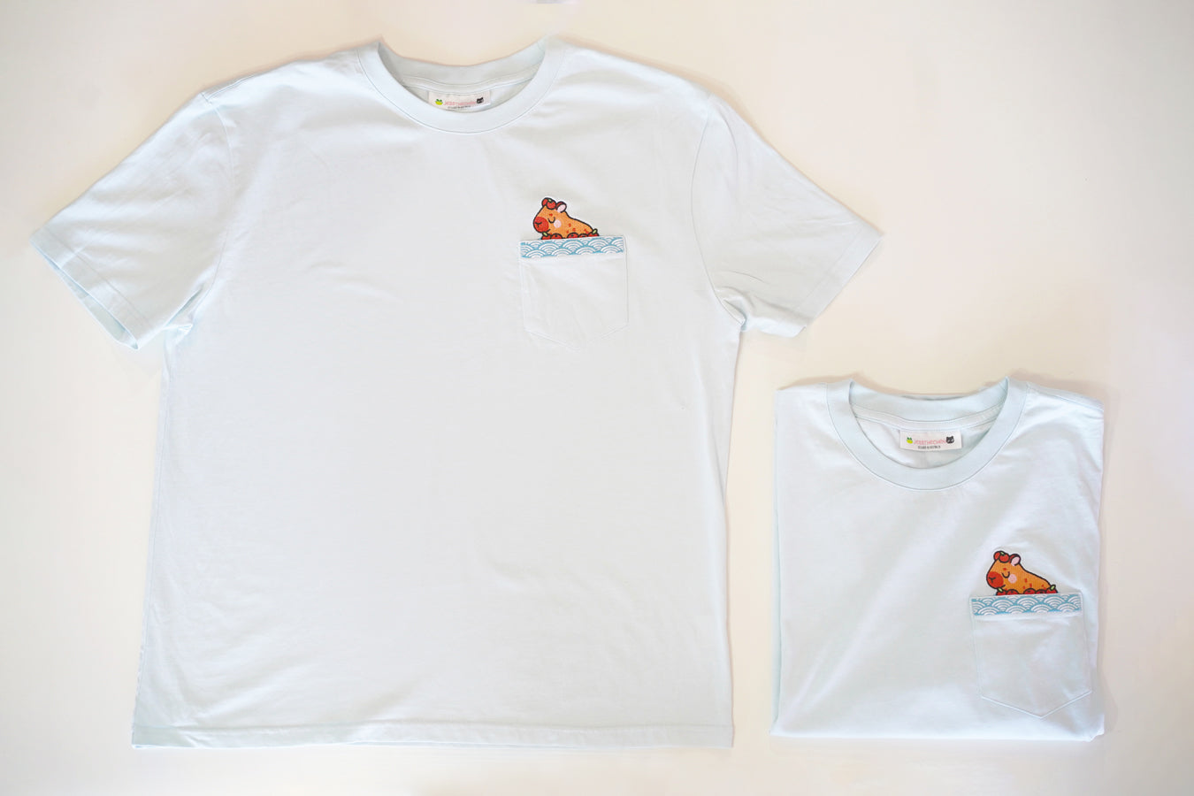 Light blue t-shirts with pocket design