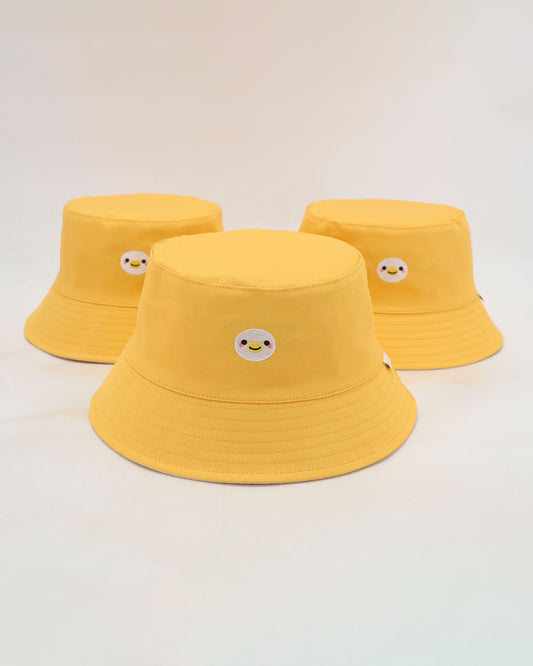 Three yellow duck bucket hats