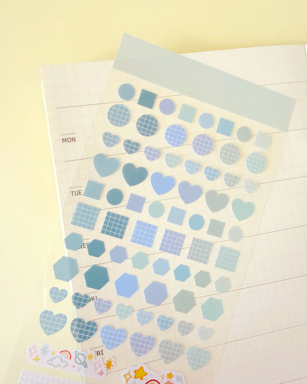 Blue basic shape stickers on planner page