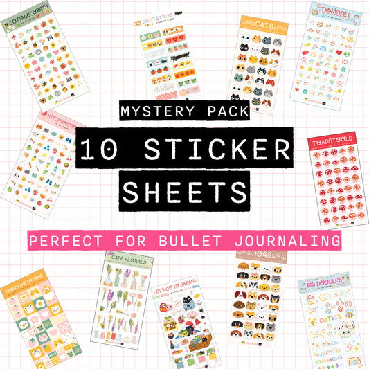 Mystery pack of 10 sticker sheets for bullet journaling on a grid background